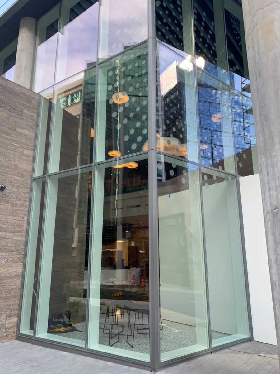 Glazing at Building Cure: curtain wall, glass doors and interior glass.