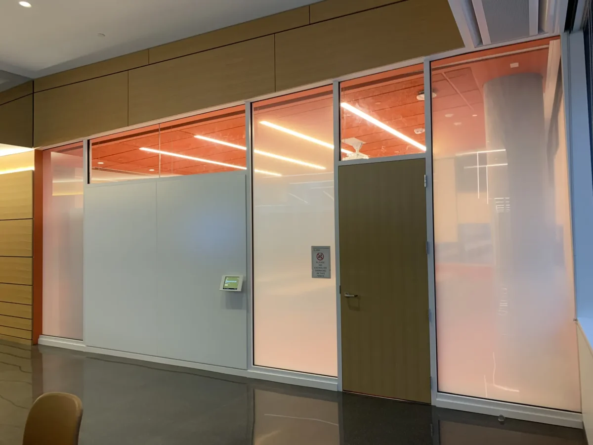 Glazing at Building Cure: curtain wall, glass doors and interior glass.