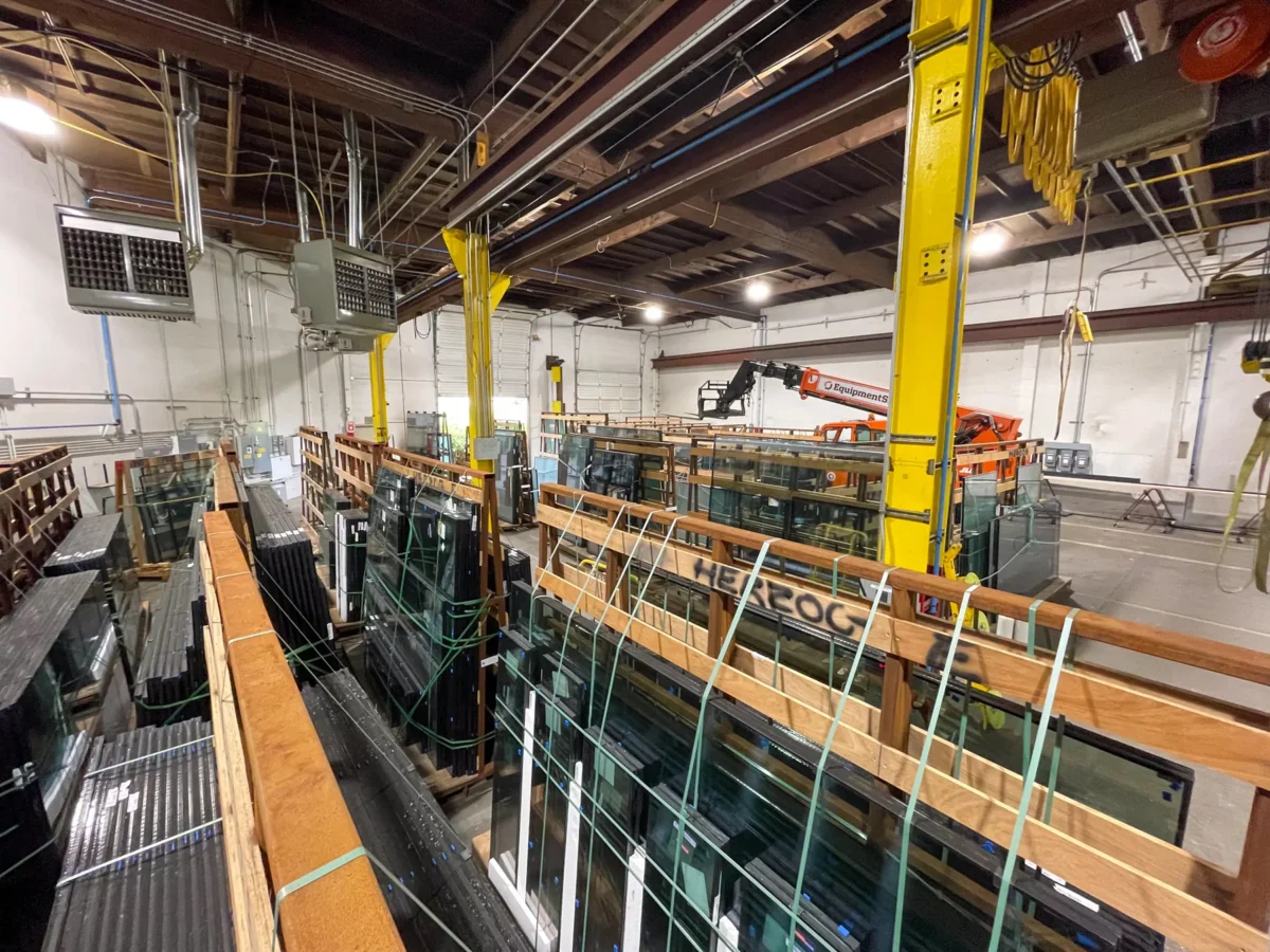 Glazing at Founders Hall: storefront, glass doors and interior glass in a mass timber building.