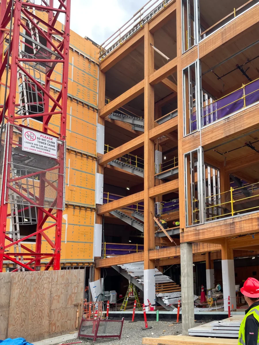 Glazing at Founders Hall: storefront, glass doors and interior glass in a mass timber building.