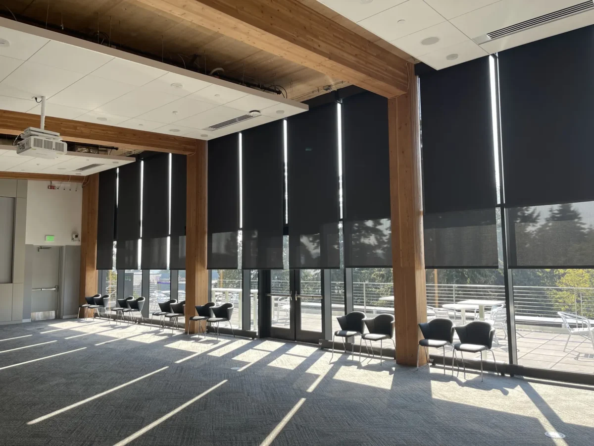 Glazing at Founders Hall: storefront, glass doors and interior glass in a mass timber building.