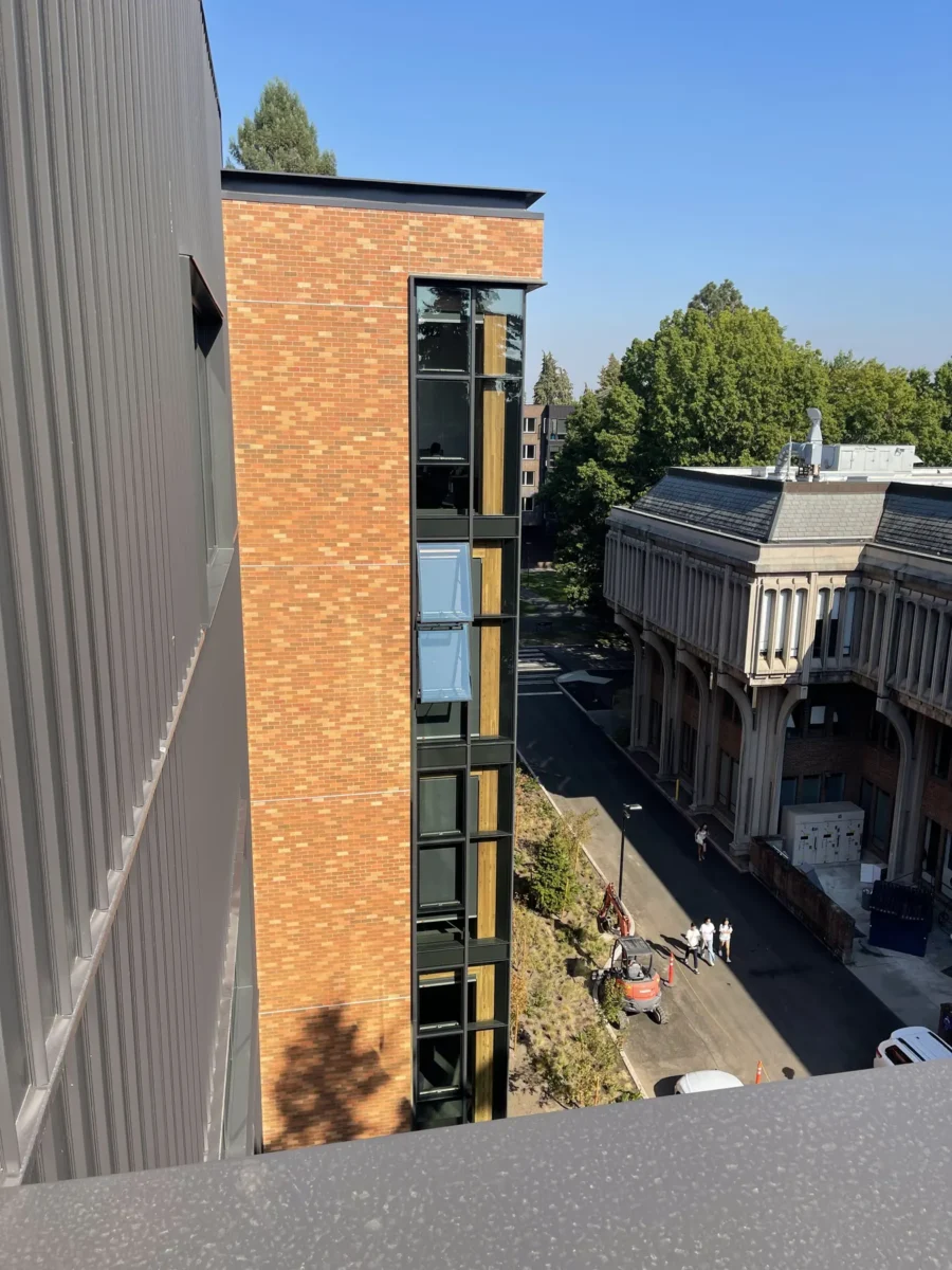 Glazing at Founders Hall: storefront, glass doors and interior glass in a mass timber building.