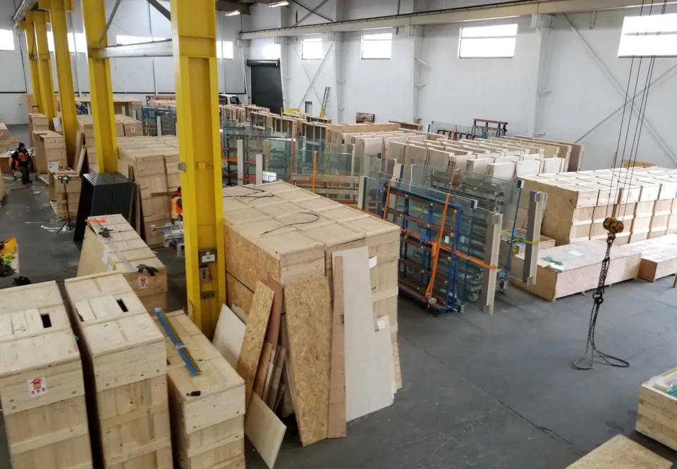 Glass units in racks and crates on the Herzog Glass shop floor