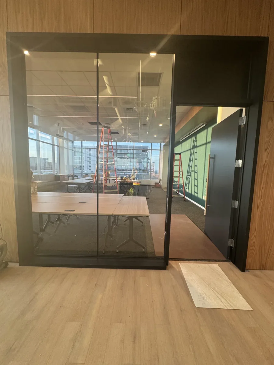 Interior glass partitions and glass stair rails at the Lincoln Square tenant improvement in Bellevue.