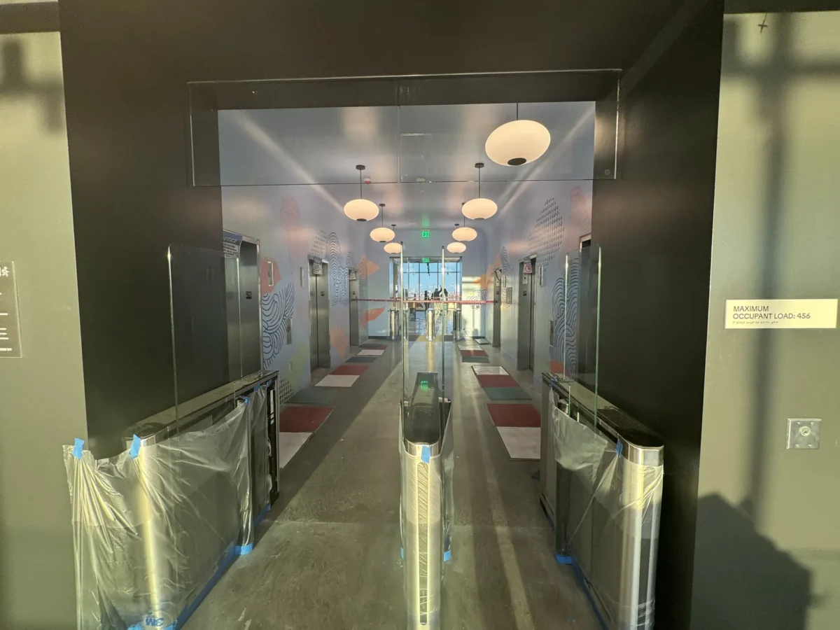 Interior glass partitions and glass stair rails at the Lincoln Square tenant improvement in Bellevue.