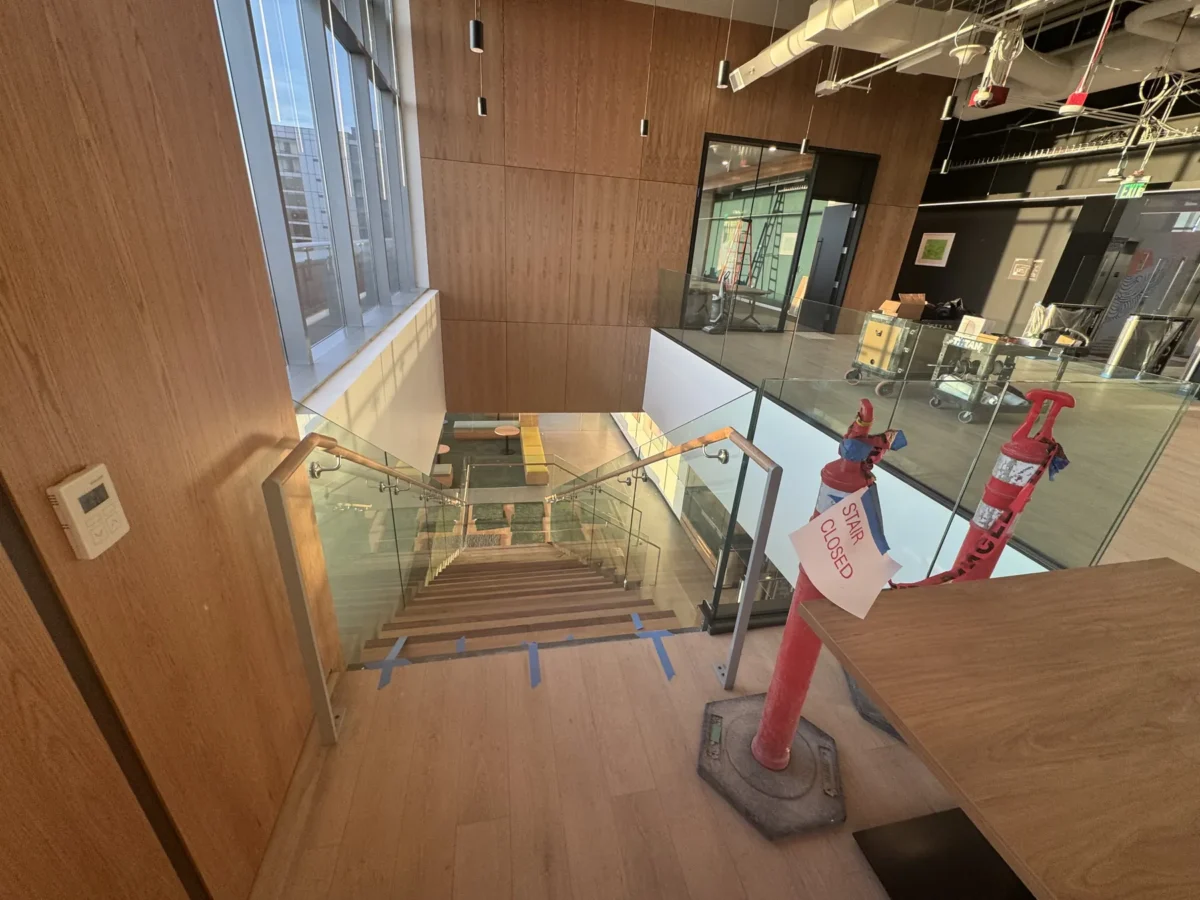Interior glass partitions and glass stair rails at the Lincoln Square tenant improvement in Bellevue.