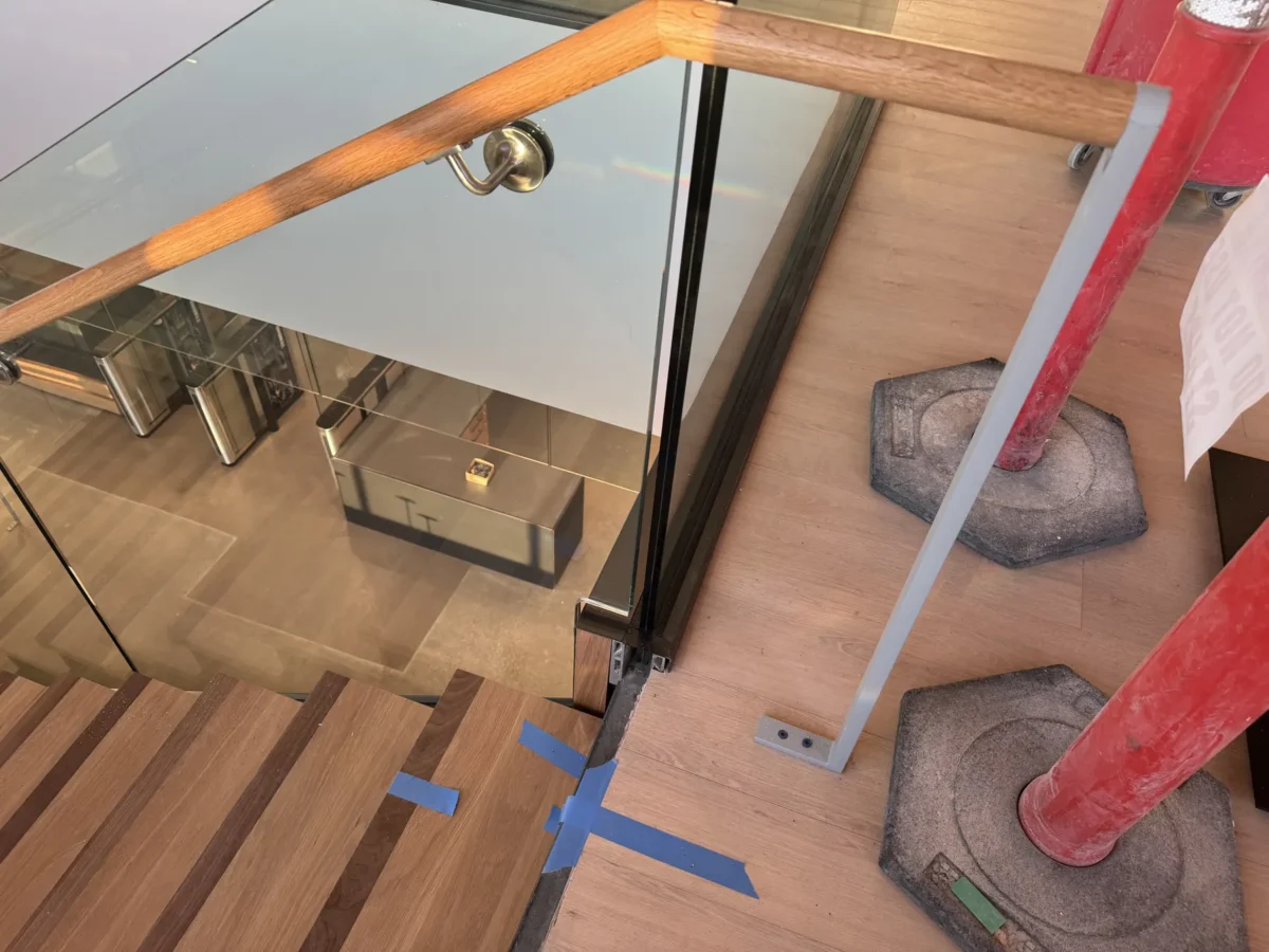 Interior glass partitions and glass stair rails at the Lincoln Square tenant improvement in Bellevue.