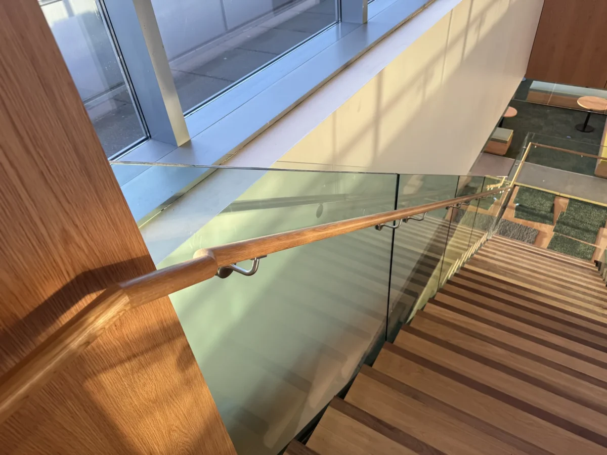 Interior glass partitions and glass stair rails at the Lincoln Square tenant improvement in Bellevue.