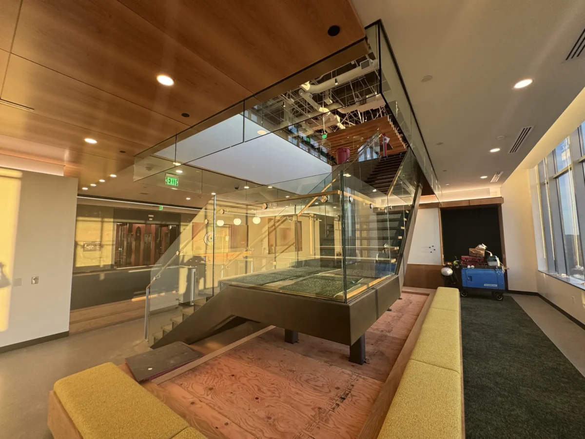 Interior glass partitions and glass stair rails at the Lincoln Square tenant improvement in Bellevue.