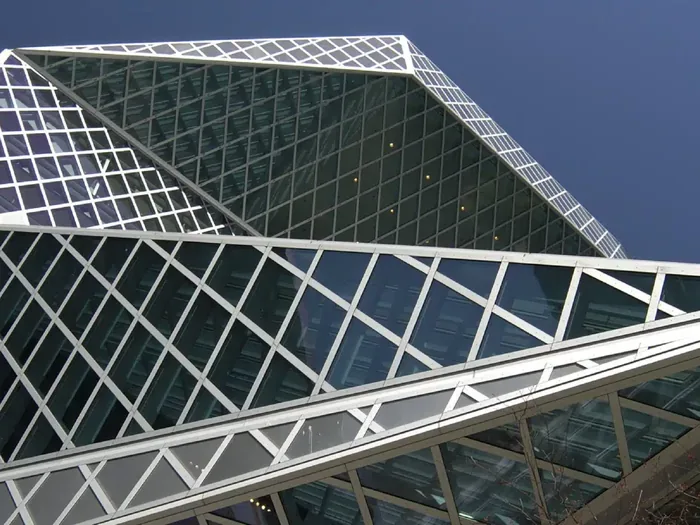 The diamond-grid glass and steel envelope of the Seattle Central Library.