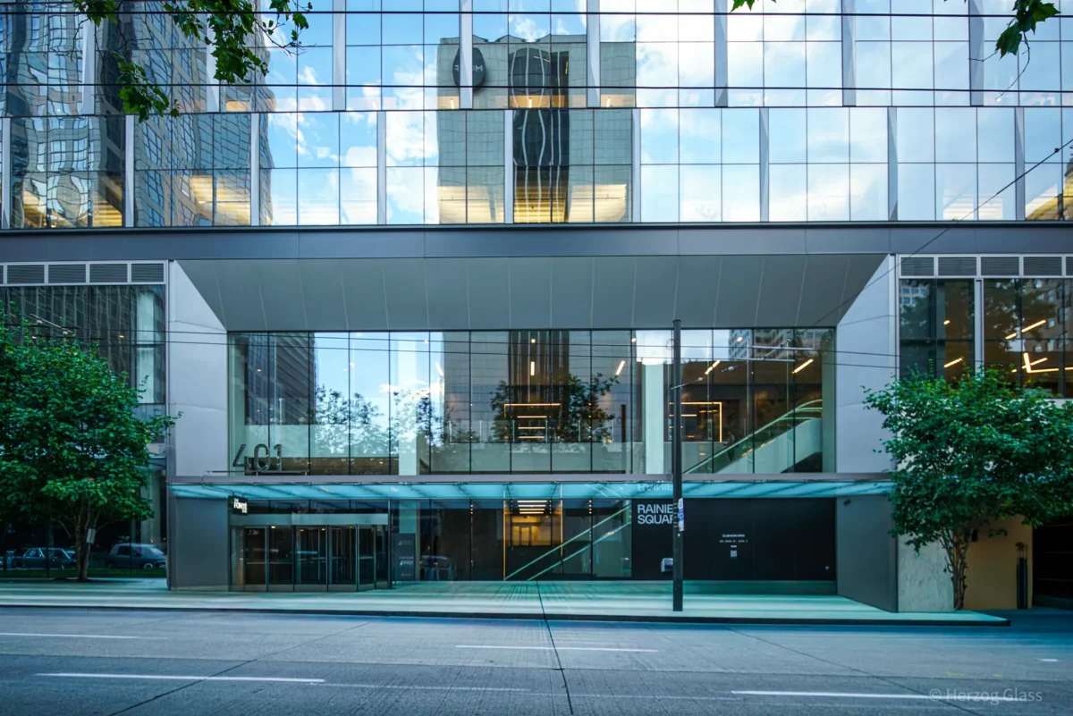 Curtain wall installation at street level at Rainier Tower in downtown Seattle.