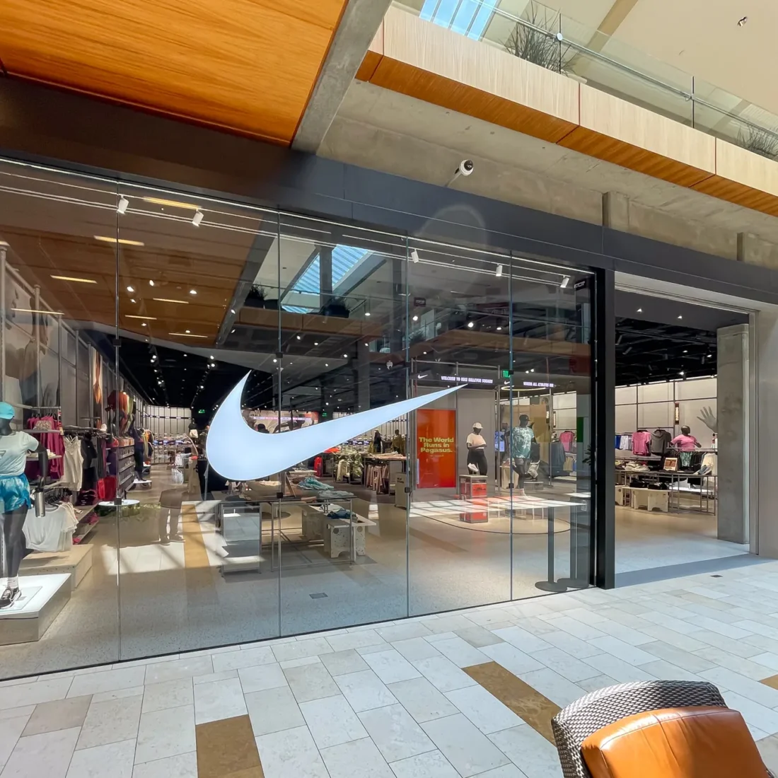 Retail storefront glazing: full-height glass shopfronts and entrances.