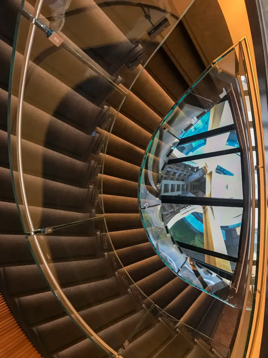 Looking straight down through the Space Needle glass floor to the structure below